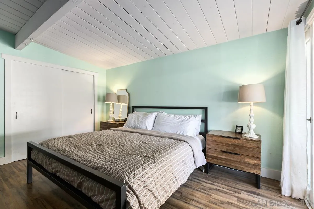 8605 Ellsworth Lane Santee, CA 92071 - Photo 14 of 26 a bedroom with a bed and a night stand