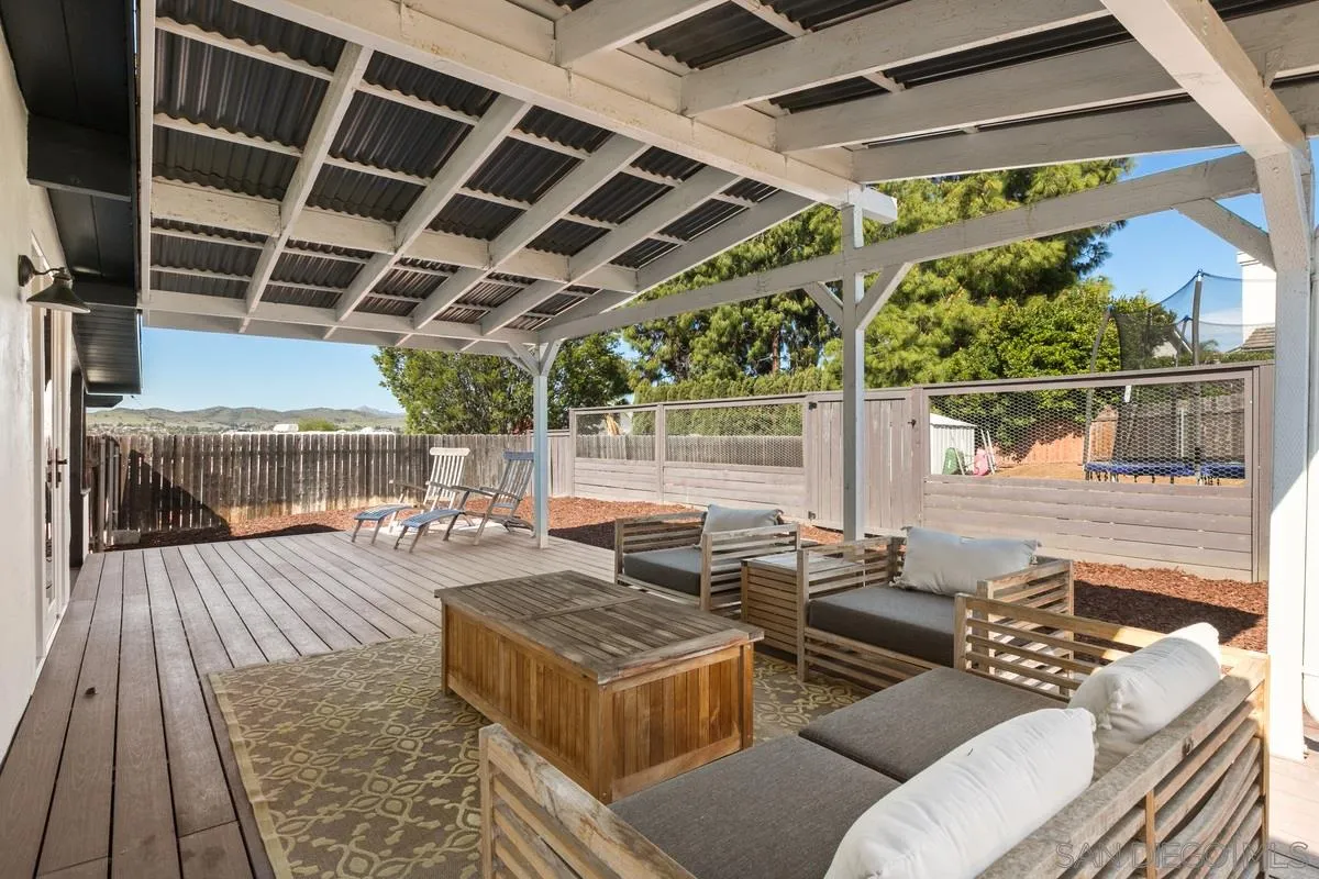 8605 Ellsworth Lane Santee, CA 92071 - Photo 20 of 26 a outdoor space with patio lots of furniture and garden view
