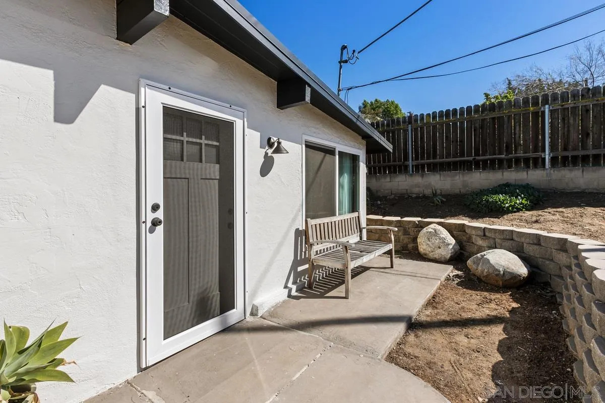 8605 Ellsworth Lane Santee, CA 92071 - Photo 2 of 26 a view of backyard with outdoor seating and barbeque oven