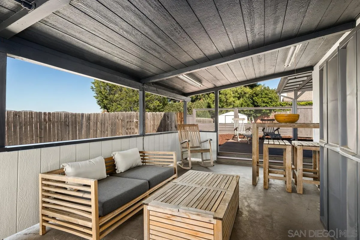 8605 Ellsworth Lane Santee, CA 92071 - Photo 23 of 26 a view of a patio with a table chairs and a patio