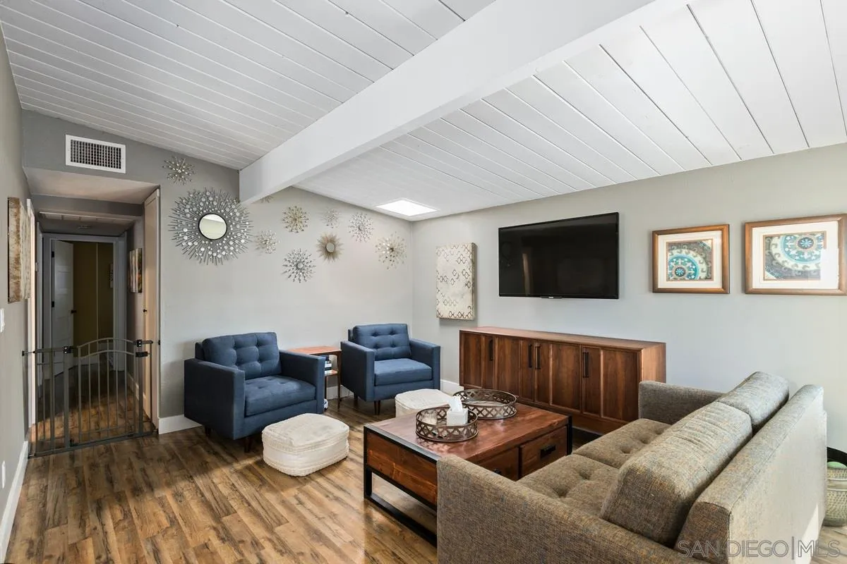 8605 Ellsworth Lane Santee, CA 92071 - Photo 3 of 26 a living room with furniture and a flat screen tv