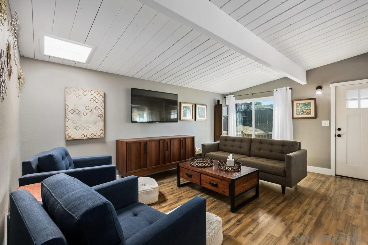 8605 Ellsworth Lane Santee, CA 92071 - Photo 4 of 26 a living room with furniture and a wooden floor