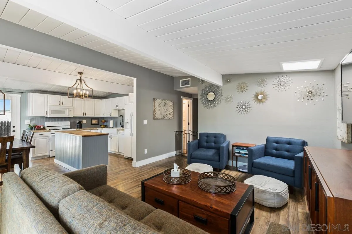 8605 Ellsworth Lane Santee, CA 92071 - Photo 5 of 26 a living room with furniture and a view of kitchen