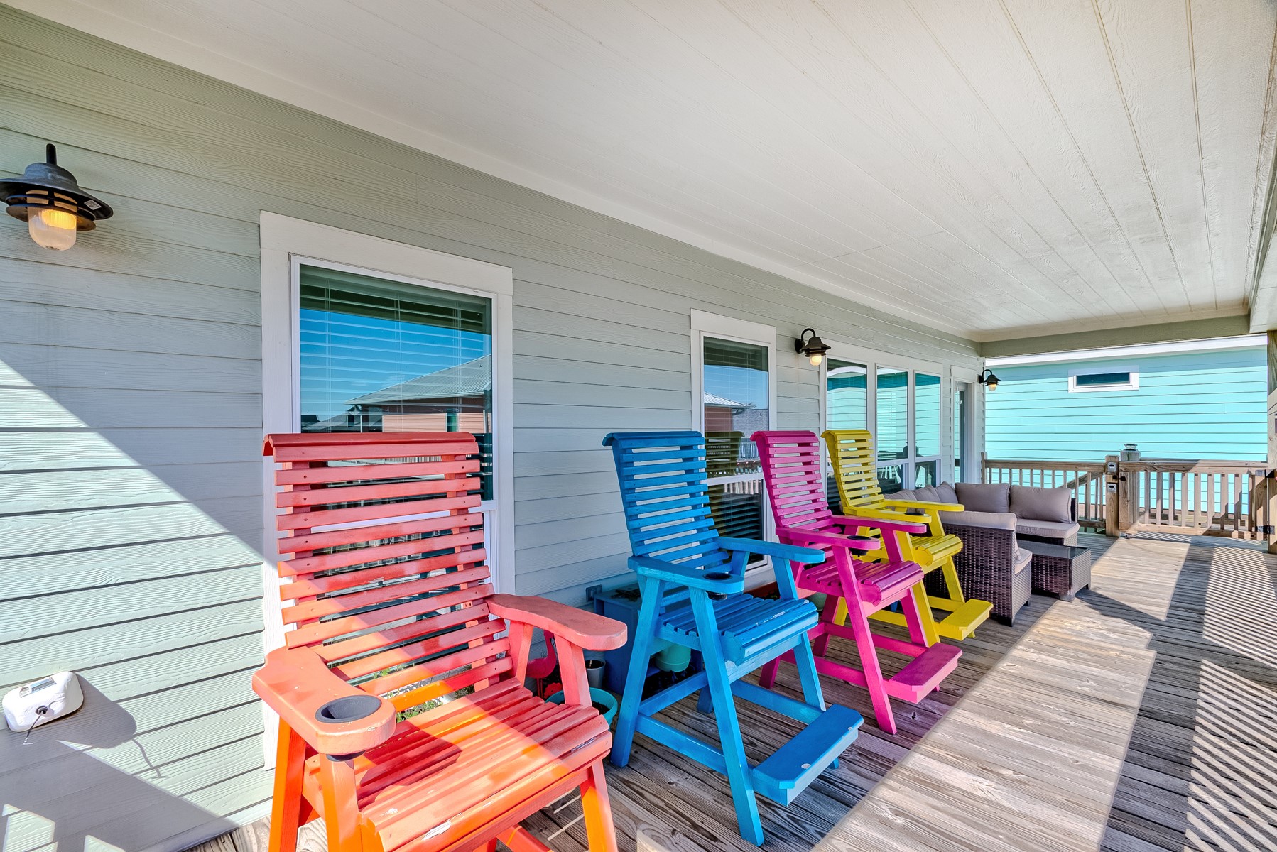 3292 Hidden Gold Crystal Beach Crystal Beach, TX 77650 - Photo 1 of 28 a backyard of a house with seating space