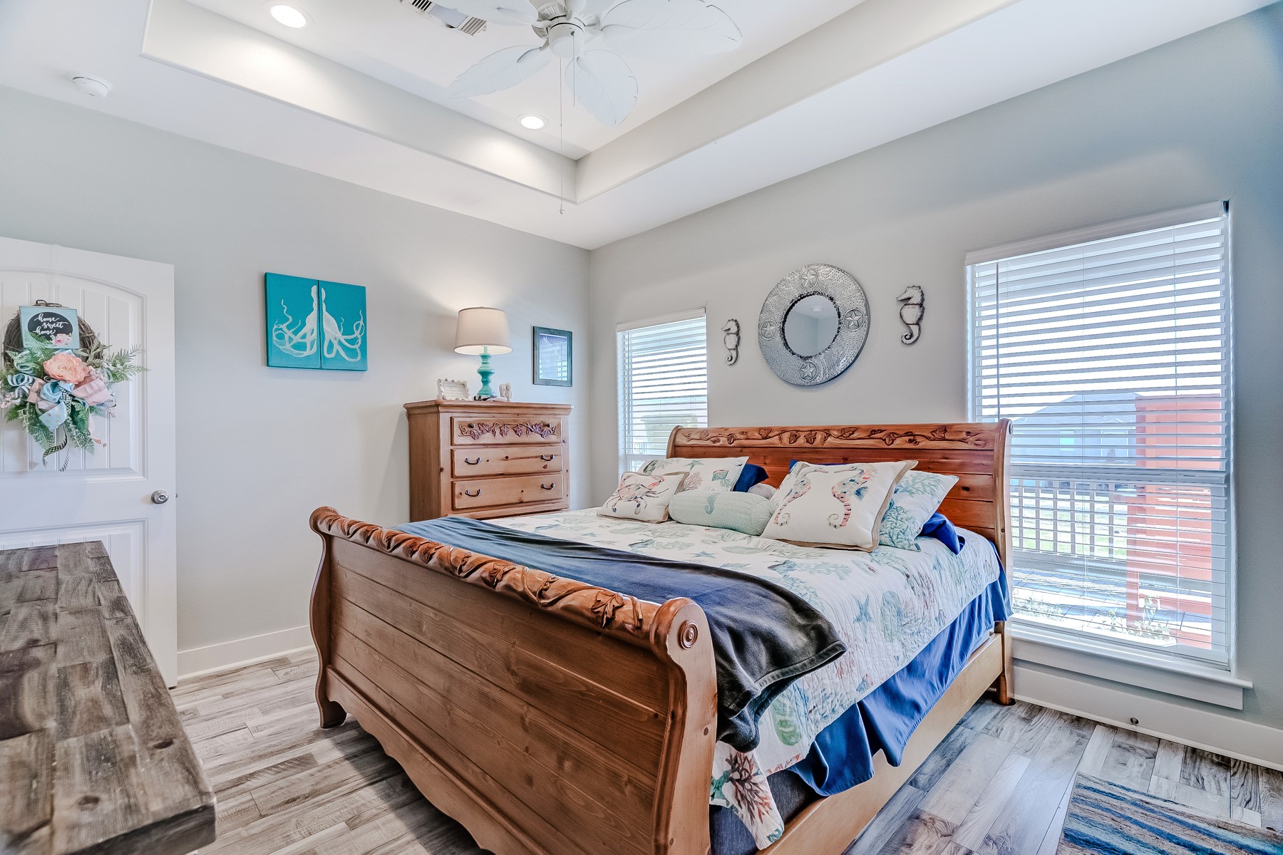 3292 Hidden Gold Crystal Beach Crystal Beach, TX 77650 - Photo 18 of 28 a bedroom with a large bed and a window