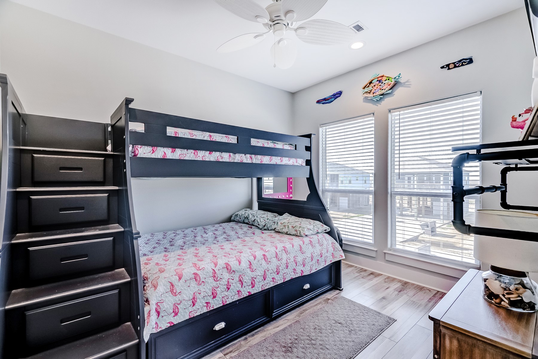 3292 Hidden Gold Crystal Beach Crystal Beach, TX 77650 - Photo 20 of 28 a bedroom with a bed and a tv on the dresser