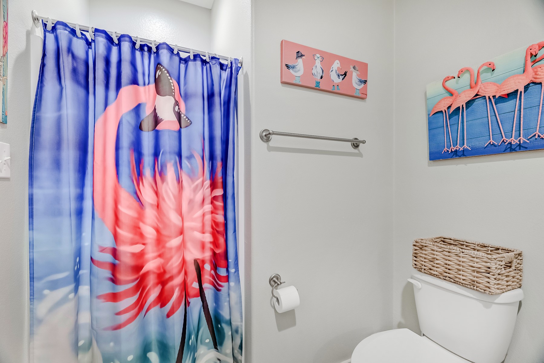 3292 Hidden Gold Crystal Beach Crystal Beach, TX 77650 - Photo 22 of 28 a bathroom with a toilet and a shower curtain