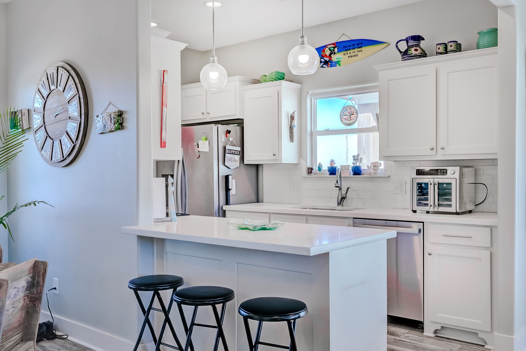 3292 Hidden Gold Crystal Beach Crystal Beach, TX 77650 - Photo 9 of 28 a kitchen with stainless steel appliances granite countertop a sink a stove and a refrigerator