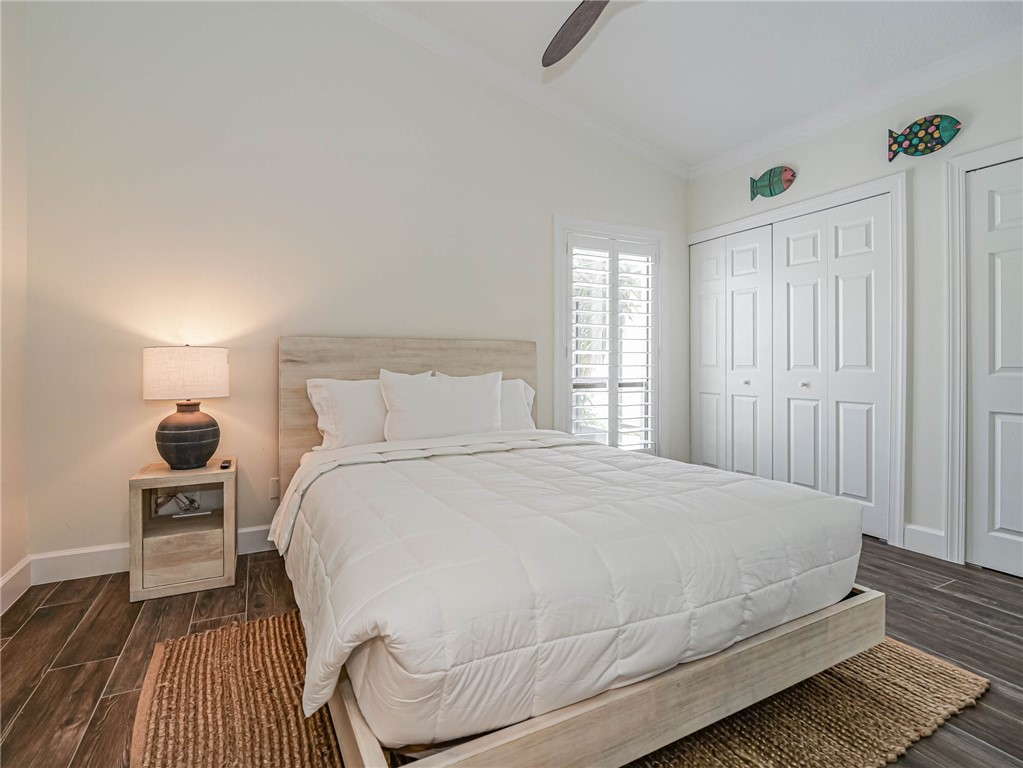 5101 Florida A1A, Unit 7 Vero Beach, FL 32963 - Photo 26 of 35 a large white bed in a white room