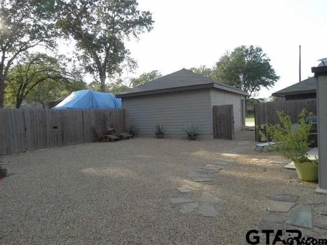 a house view with a outdoor space