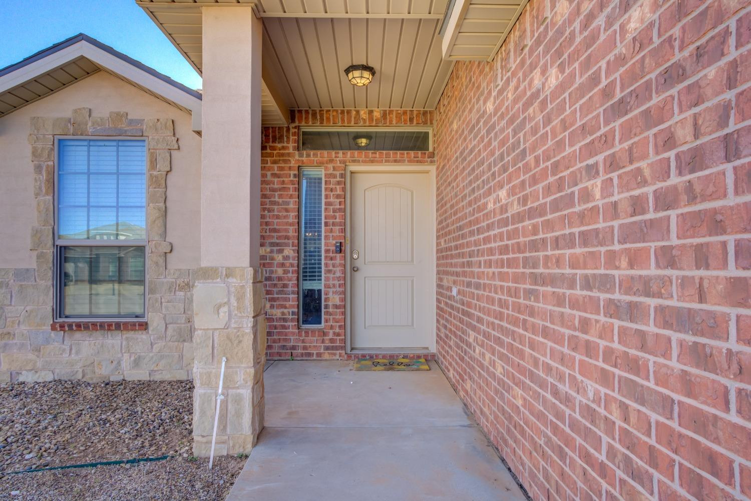 5725 110th Street Lubbock, TX 79424 - Photo 2 of 24 a view of front door of house
