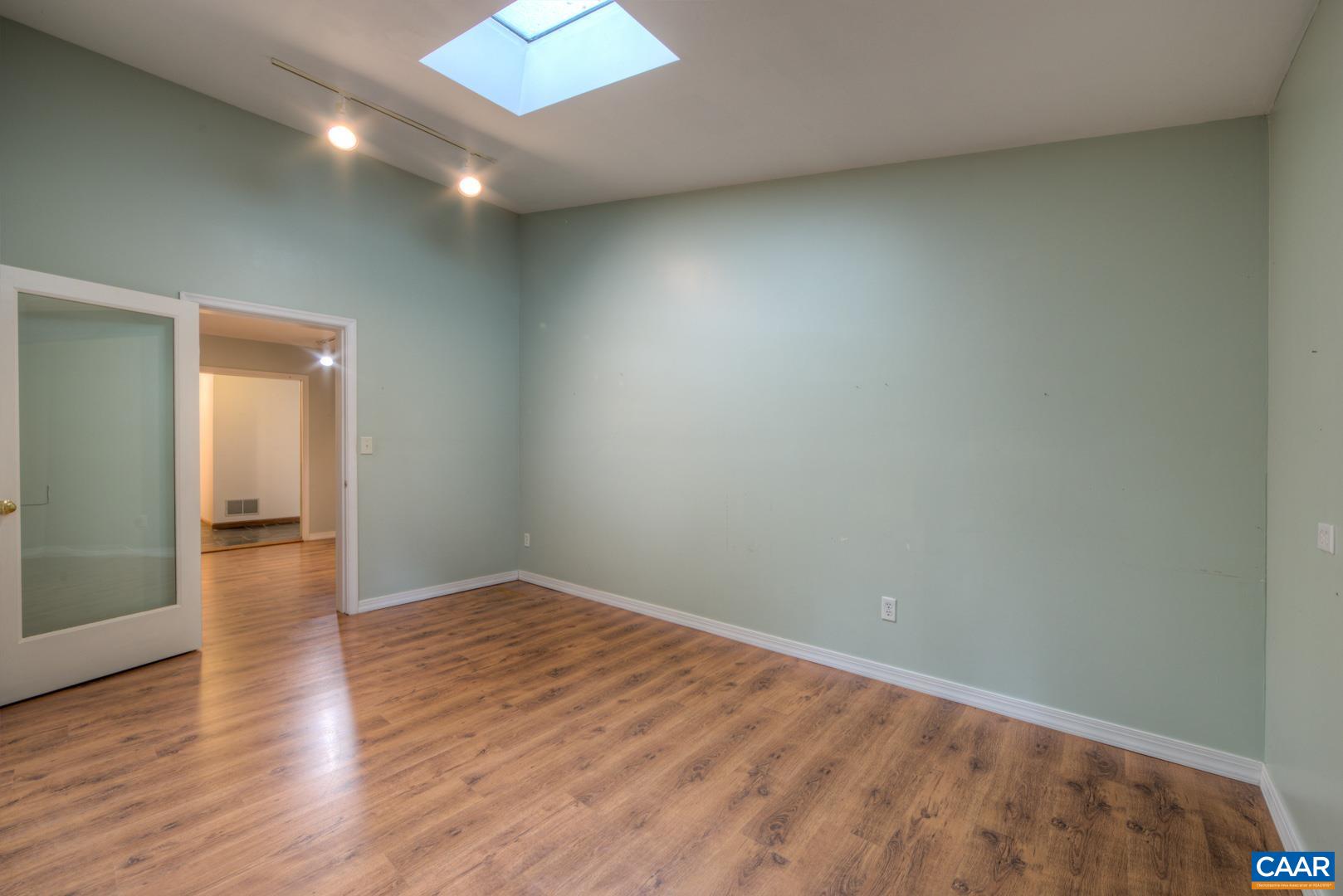 305 Cedar Bluff Road Charlottesville, VA 22901 - Photo 19 of 37 an empty room with wooden floor and closet