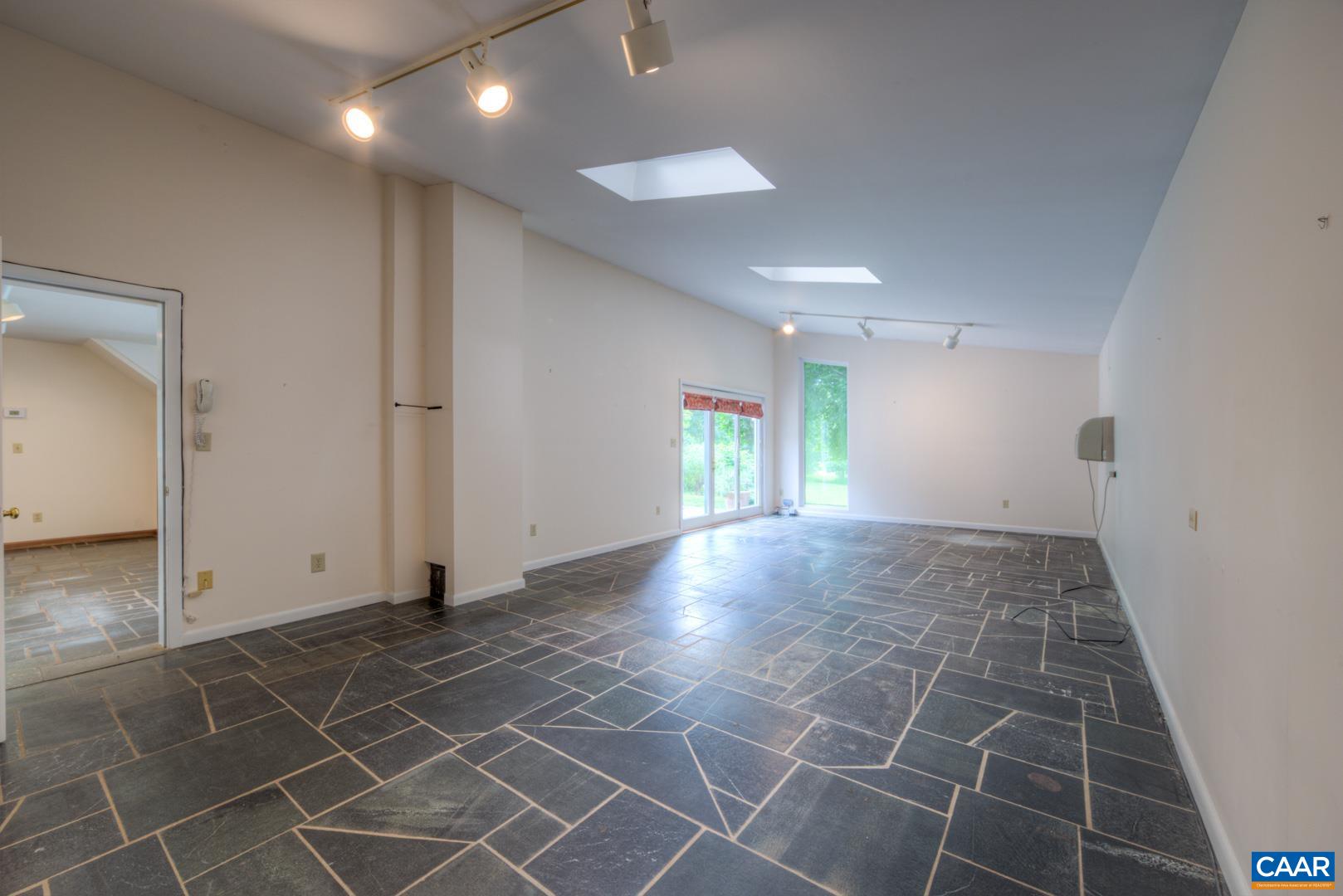 305 Cedar Bluff Road Charlottesville, VA 22901 - Photo 23 of 37 a view of an empty room and a window
