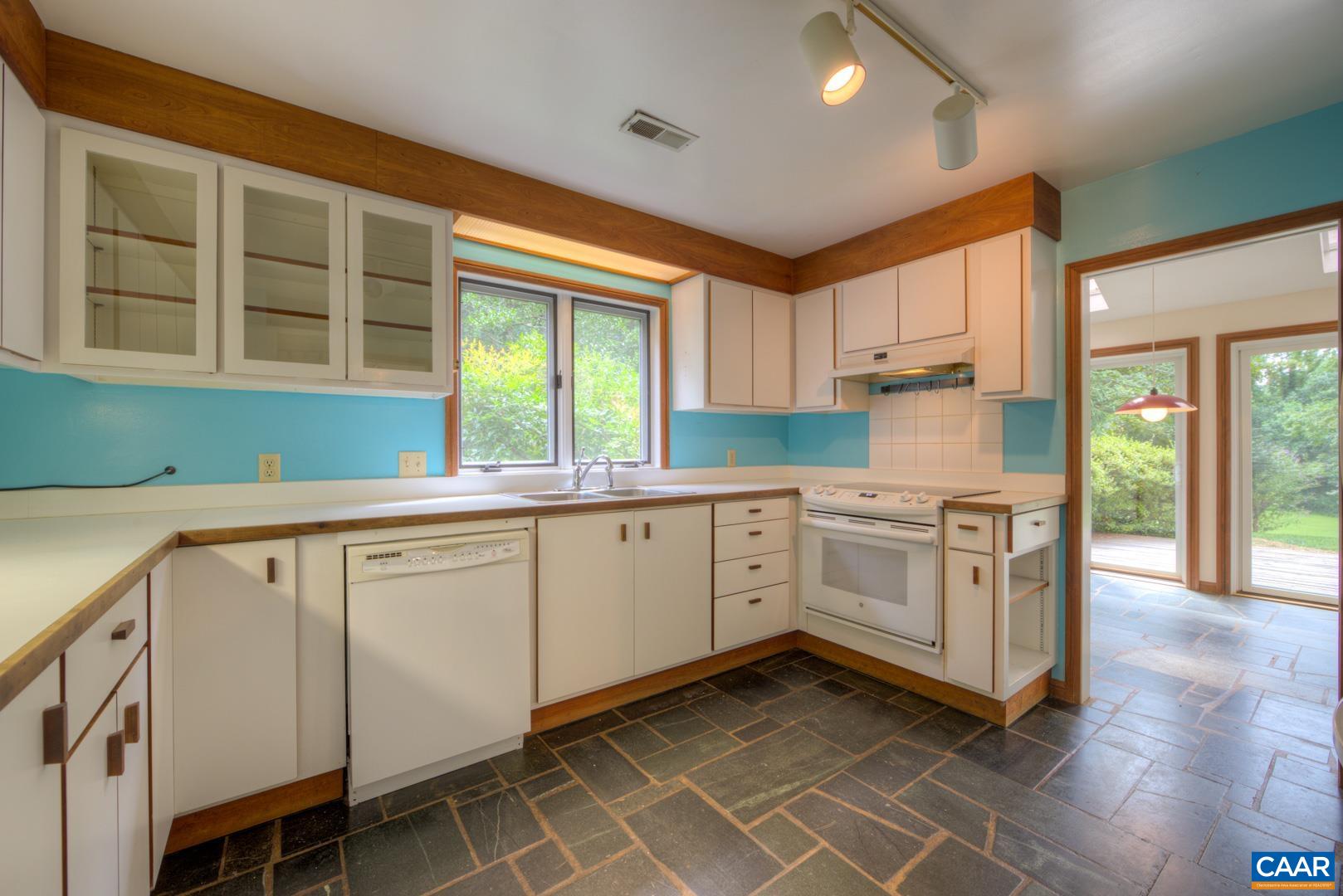 305 Cedar Bluff Road Charlottesville, VA 22901 - Photo 26 of 37 a kitchen that has a cabinets and window