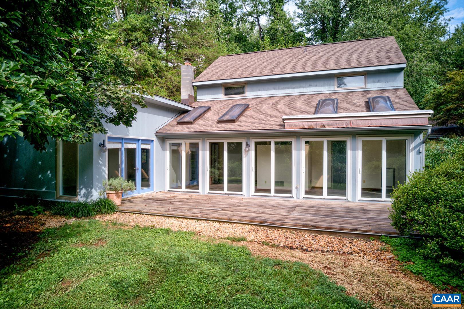 305 Cedar Bluff Road Charlottesville, VA 22901 - Photo 3 of 37 a front view of a house with a garden