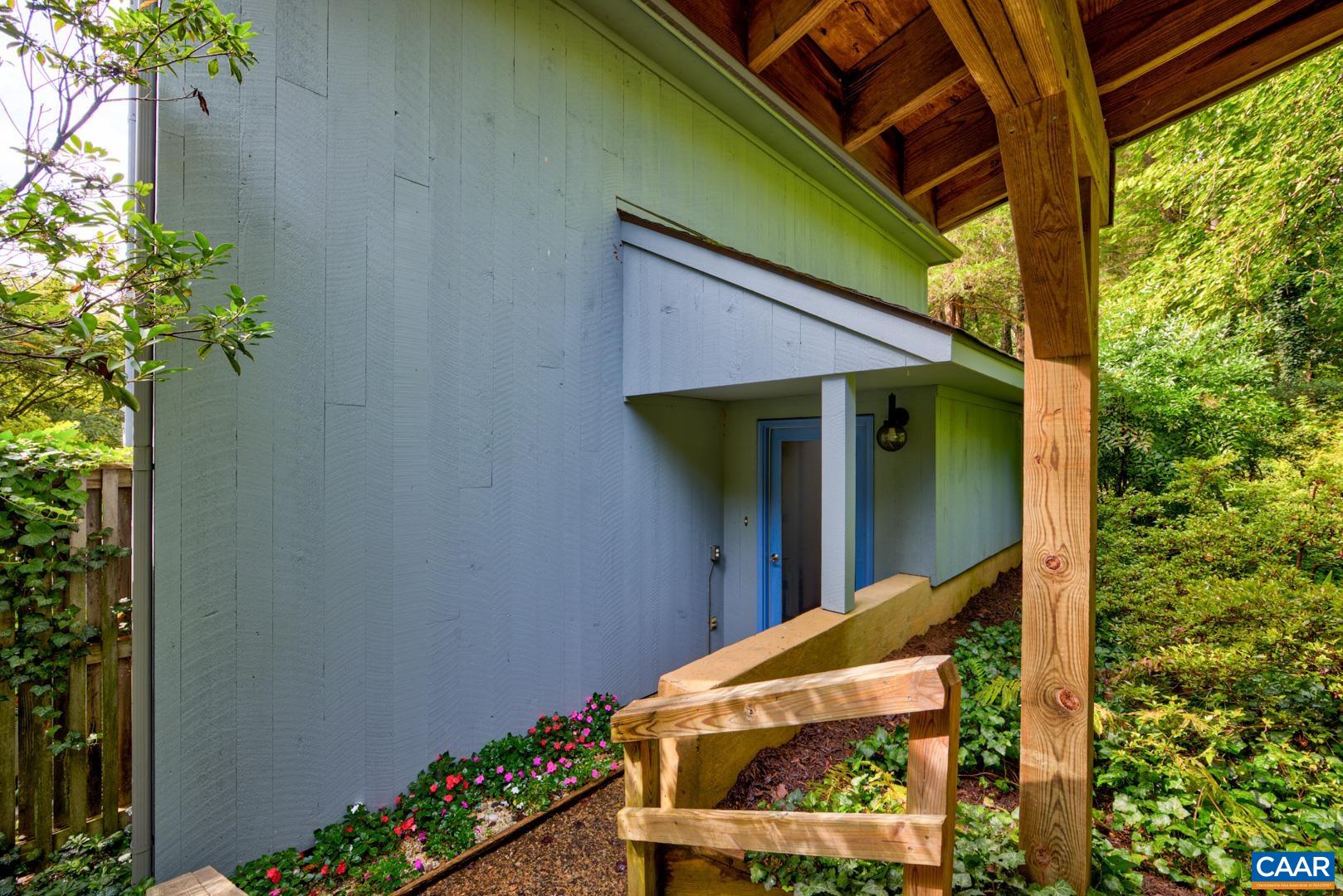 305 Cedar Bluff Road Charlottesville, VA 22901 - Photo 4 of 37 a view of a backyard with plants