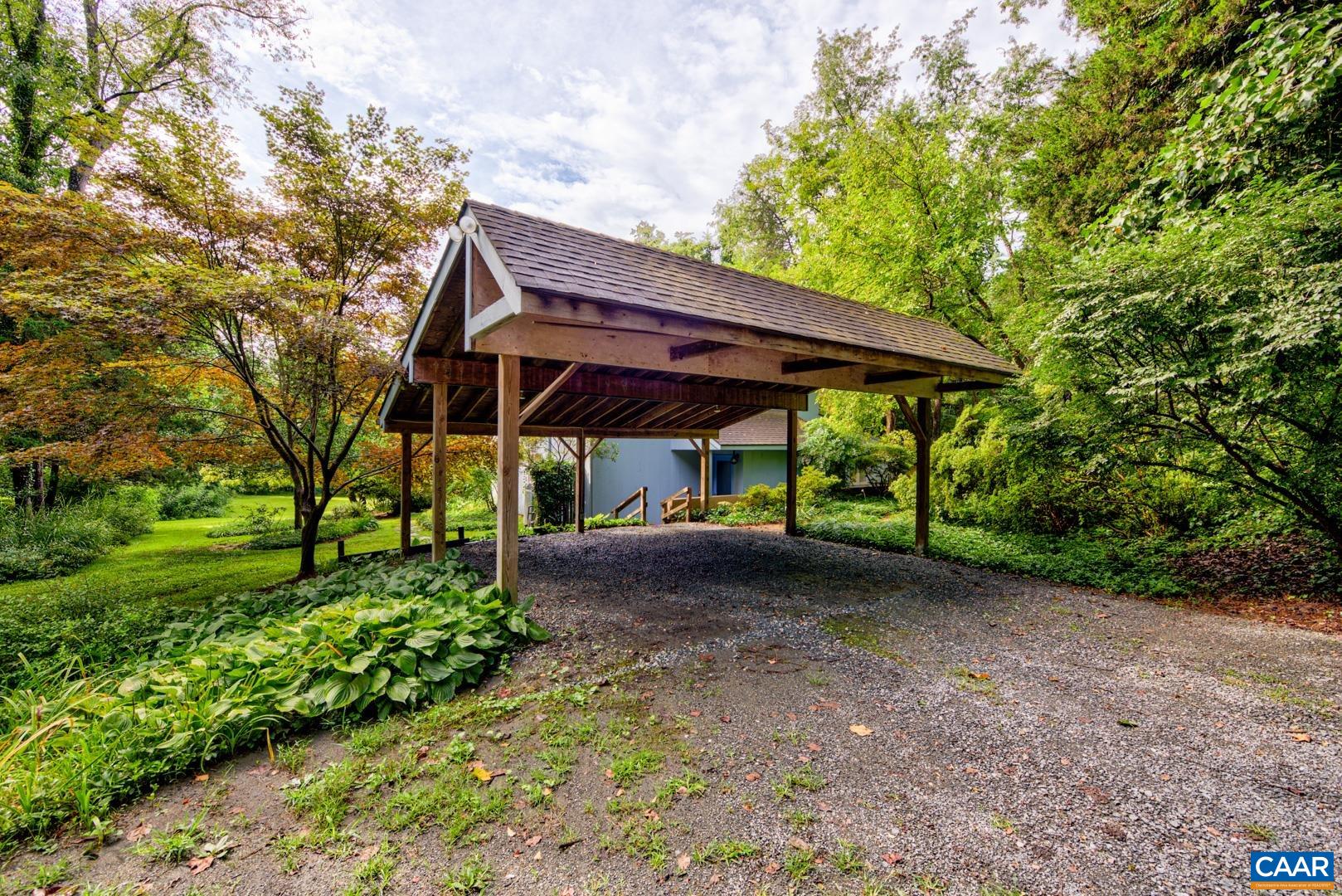 305 Cedar Bluff Road Charlottesville, VA 22901 - Photo 6 of 37 a view of a barn with big trees