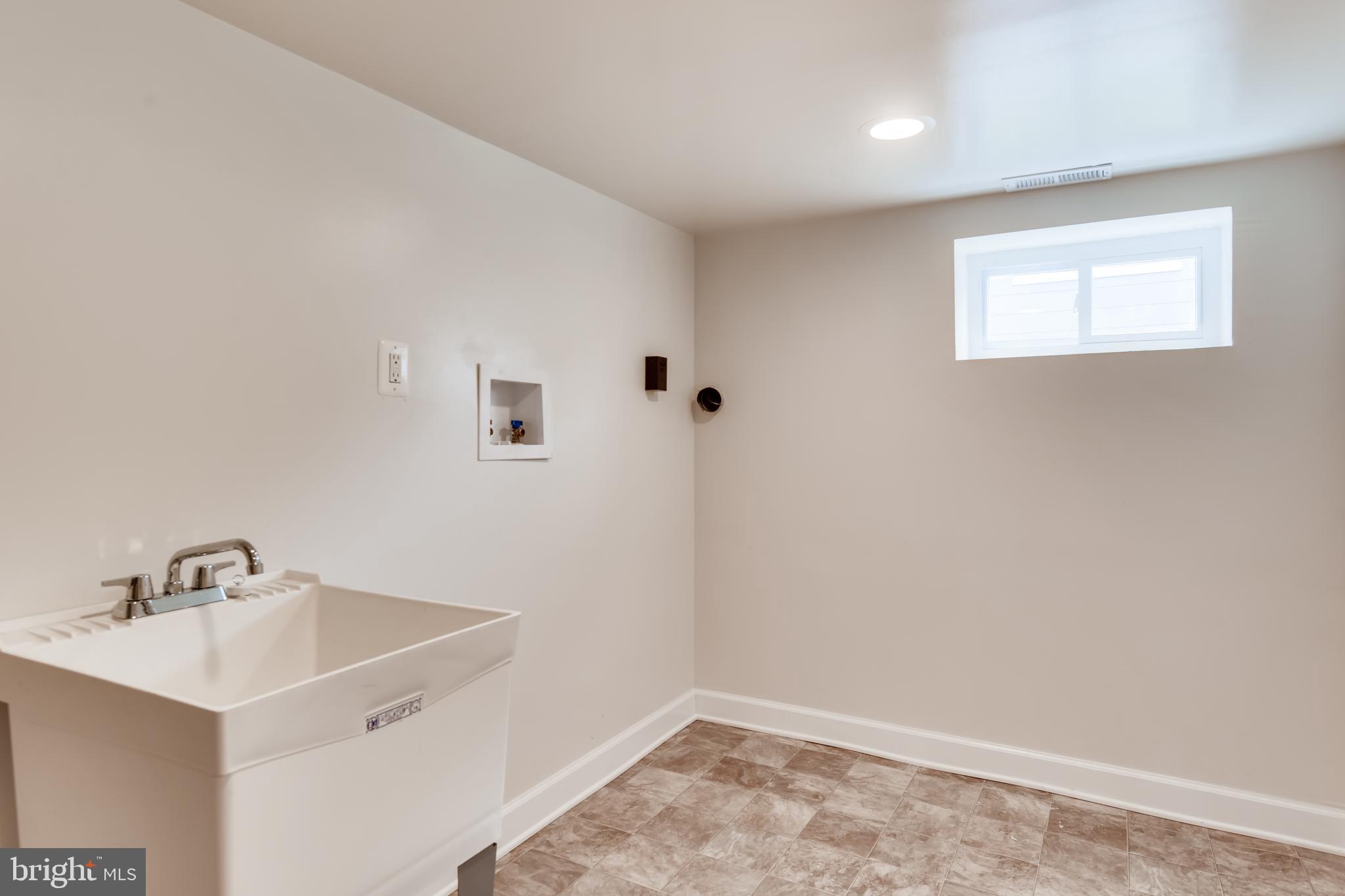 2610 Canterbury Road Baltimore, MD 21234 - Photo 25 of 29 ENCLOSED AREA FOR WASHER/DRYER