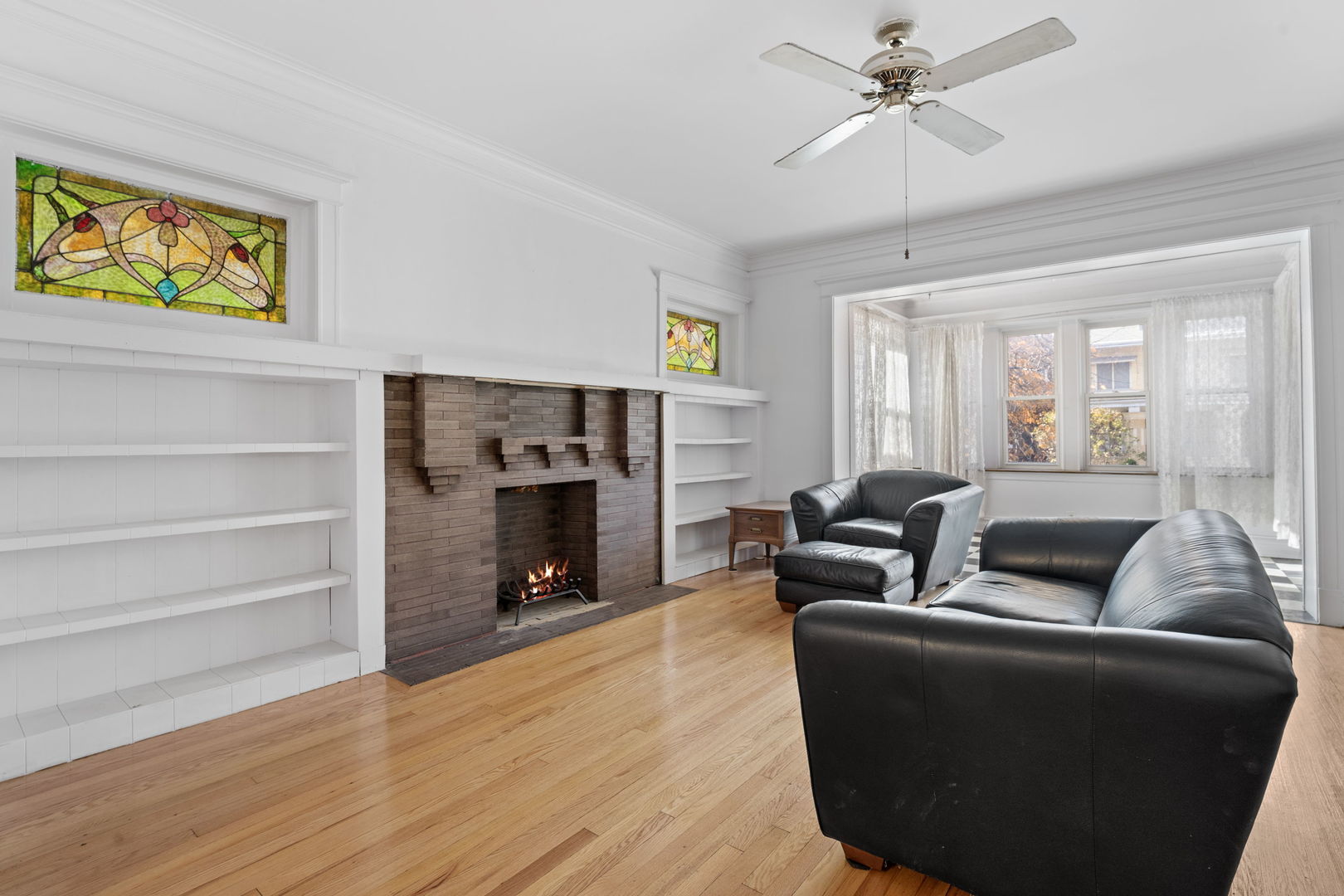8015 South Sangamon Street Chicago, IL 60620 - Photo 5 of 17 a living room with furniture and a fireplace