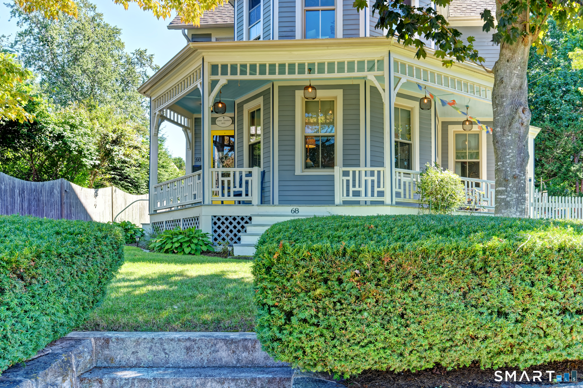 front view of a house with a yard