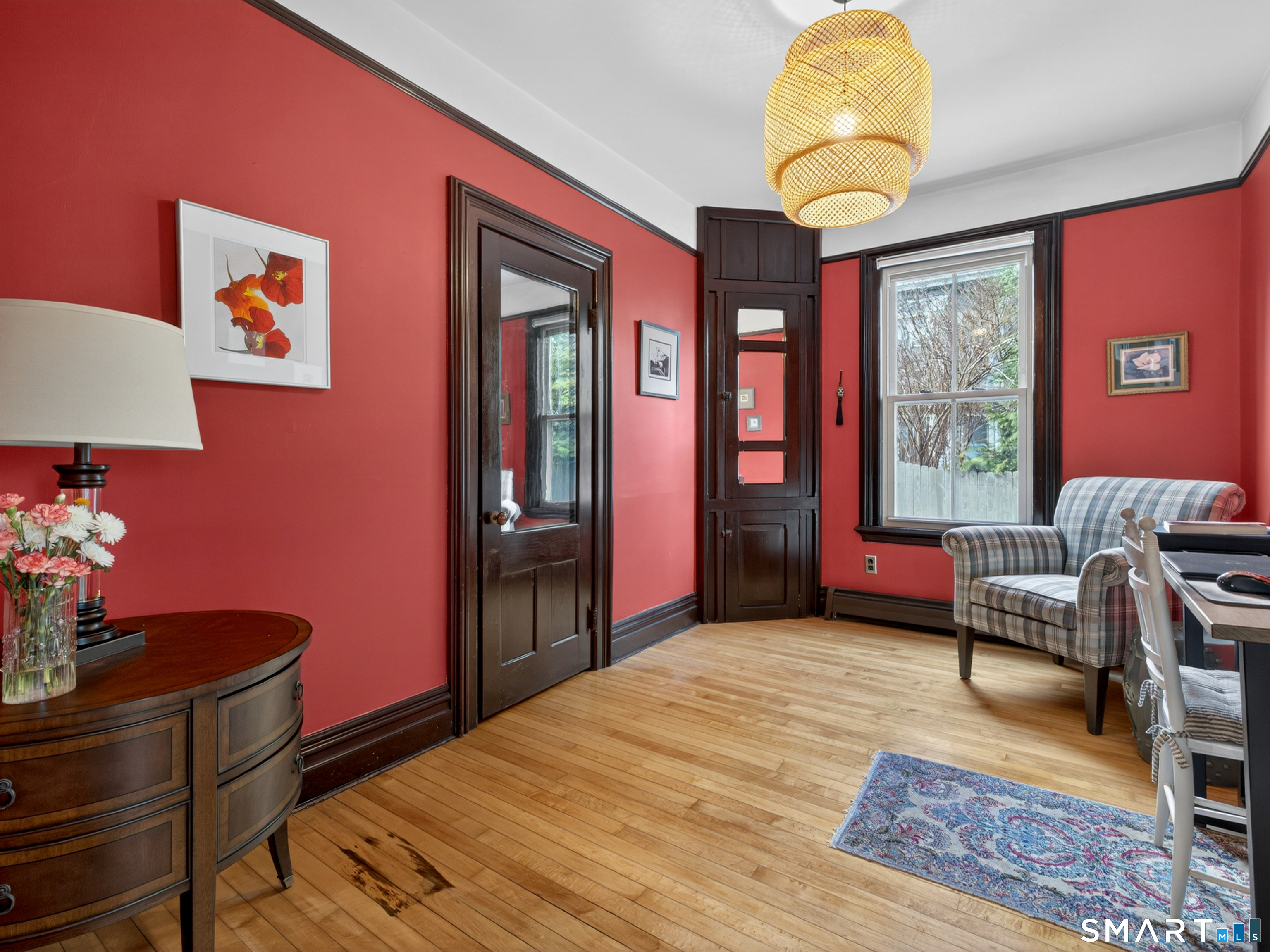 68 Ramsdell Street Groton, CT 06340 - Photo 12 of 31 a bedroom with a bed and wooden floor