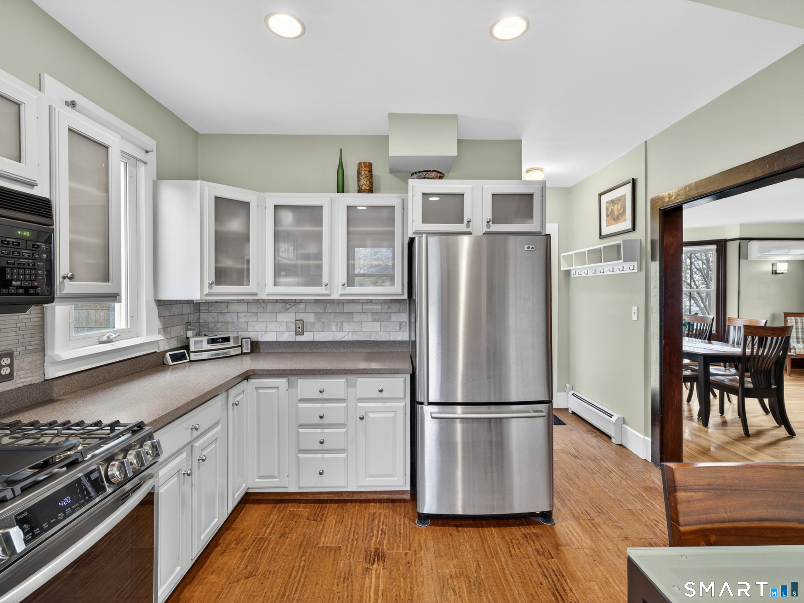 68 Ramsdell Street Groton, CT 06340 - Photo 15 of 31 a kitchen with stainless steel appliances granite countertop a refrigerator stove and sink