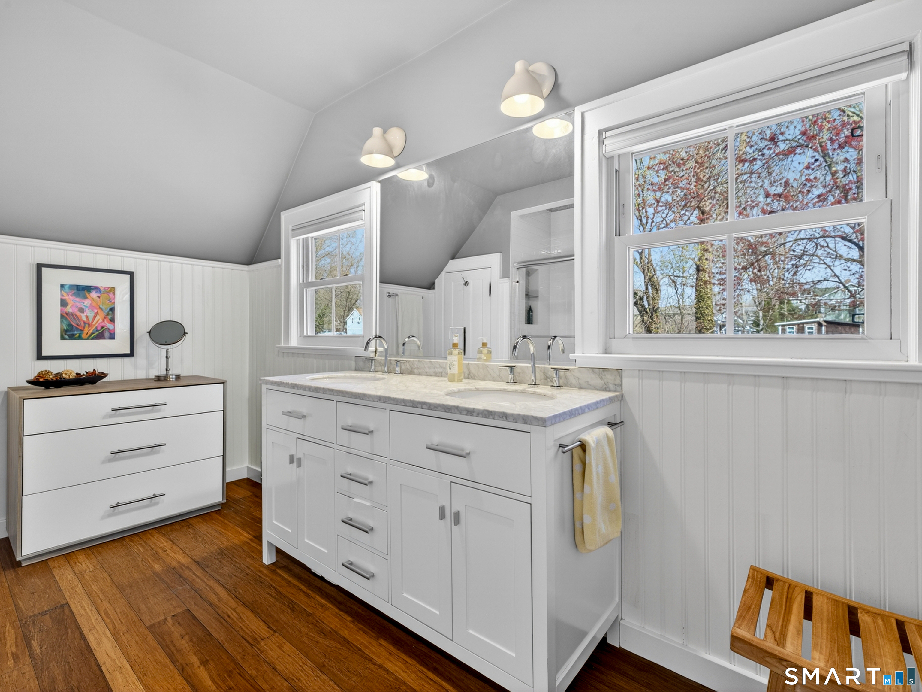 68 Ramsdell Street Groton, CT 06340 - Photo 23 of 31 a bathroom with a double vanity sink and a window