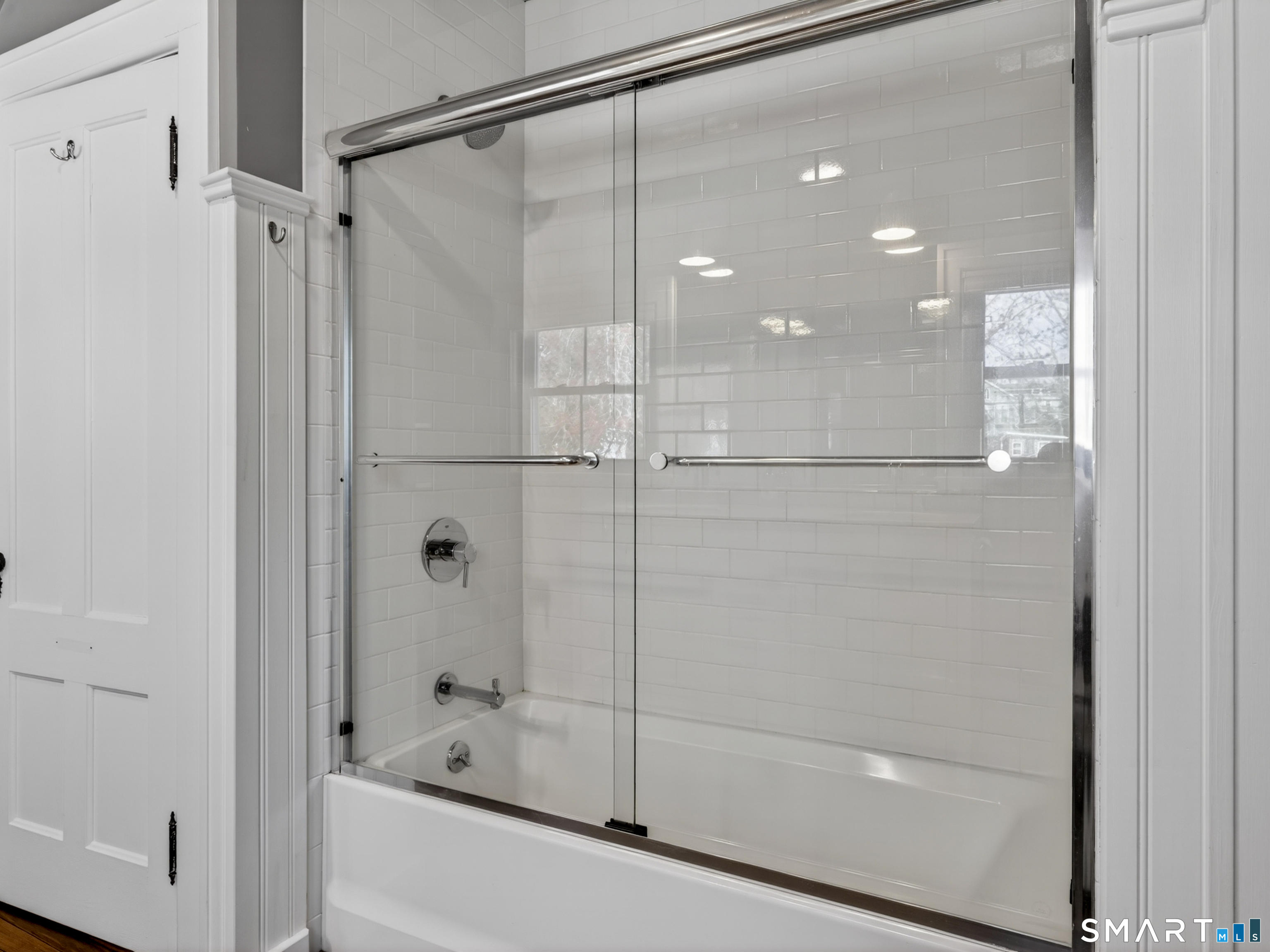 68 Ramsdell Street Groton, CT 06340 - Photo 24 of 31 a bathroom with a shower and a glass door