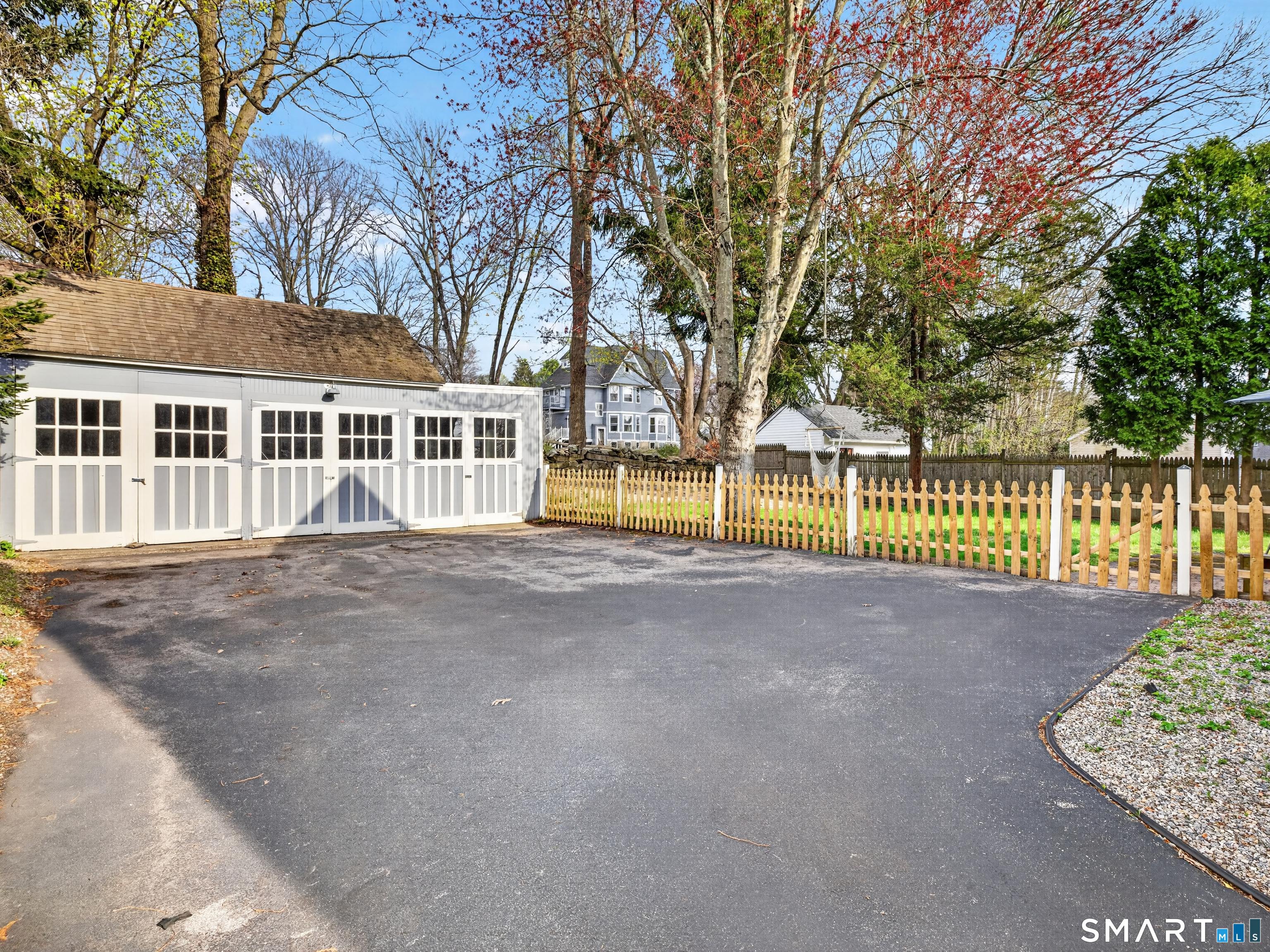 68 Ramsdell Street Groton, CT 06340 - Photo 28 of 31 a view of a house with a garden and pathway
