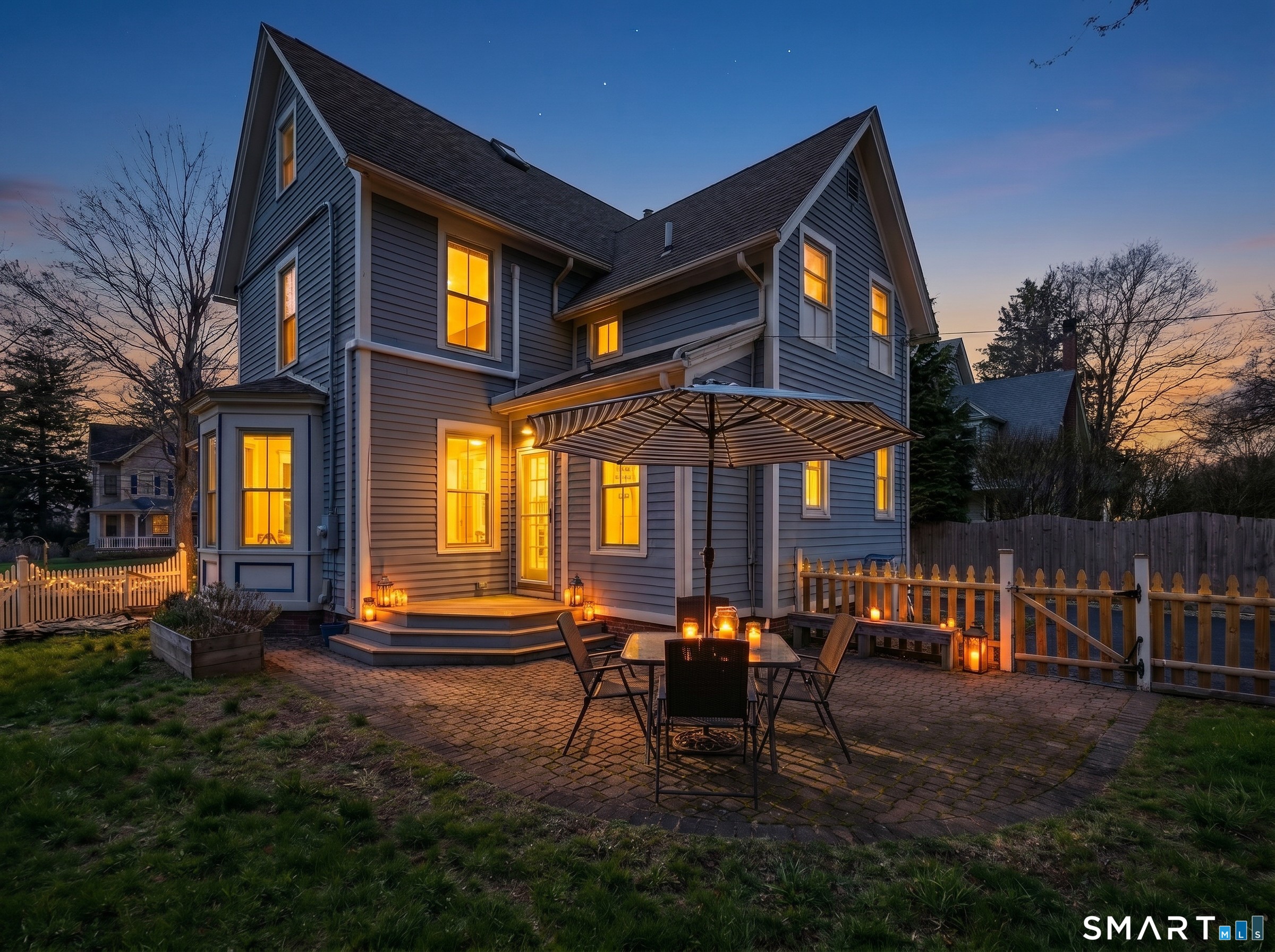 68 Ramsdell Street Groton, CT 06340 - Photo 31 of 31 a front view of a house with a yard table and chairs