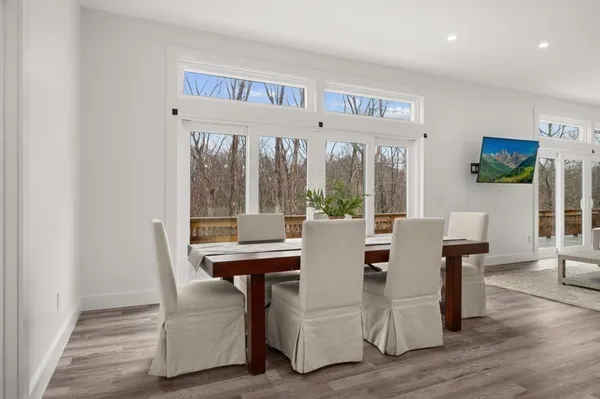 a view of a livingroom with furniture and window
