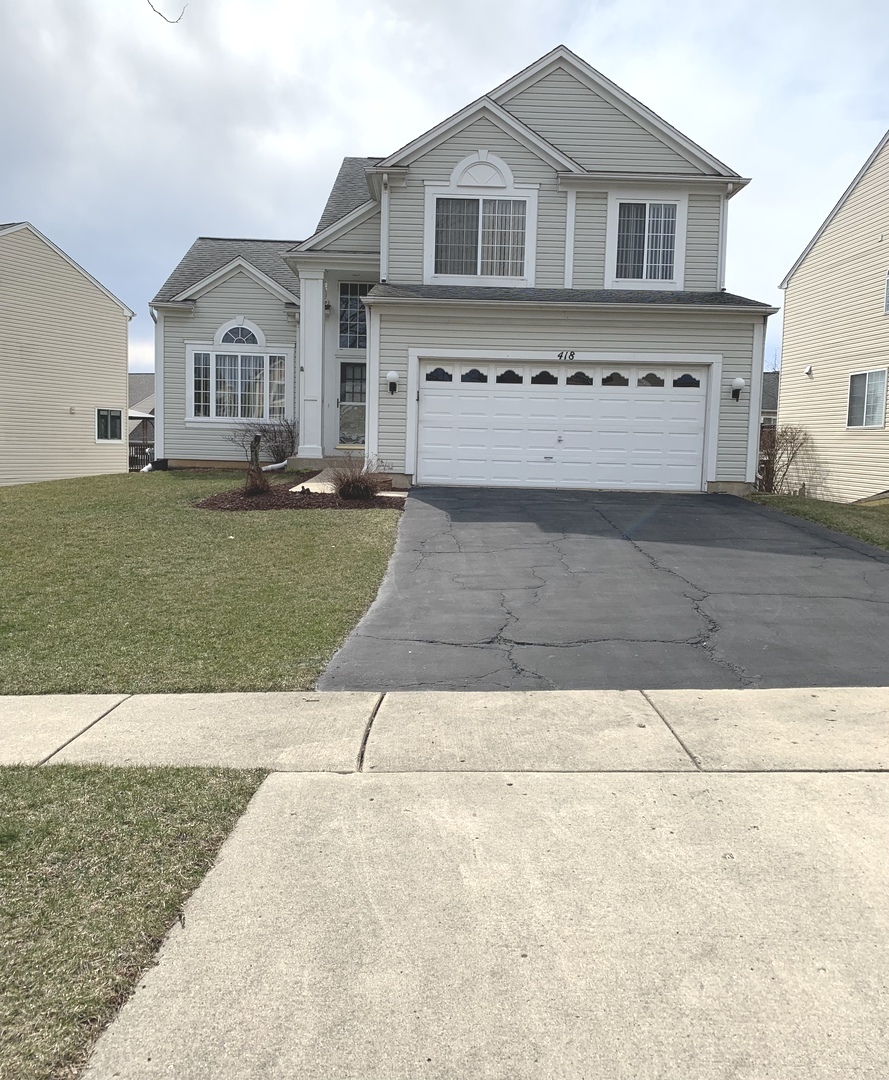 418 Cardinal Drive Bartlett, IL 60103 - Photo 1 of 29 a view of front of house with a yard
