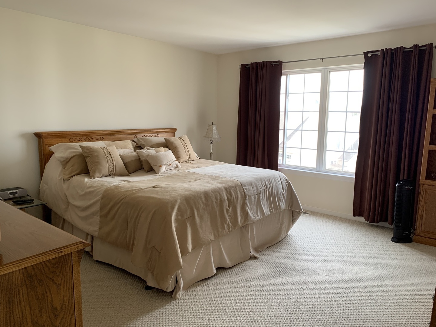 418 Cardinal Drive Bartlett, IL 60103 - Photo 12 of 29 a bed sitting in a bedroom next to a window