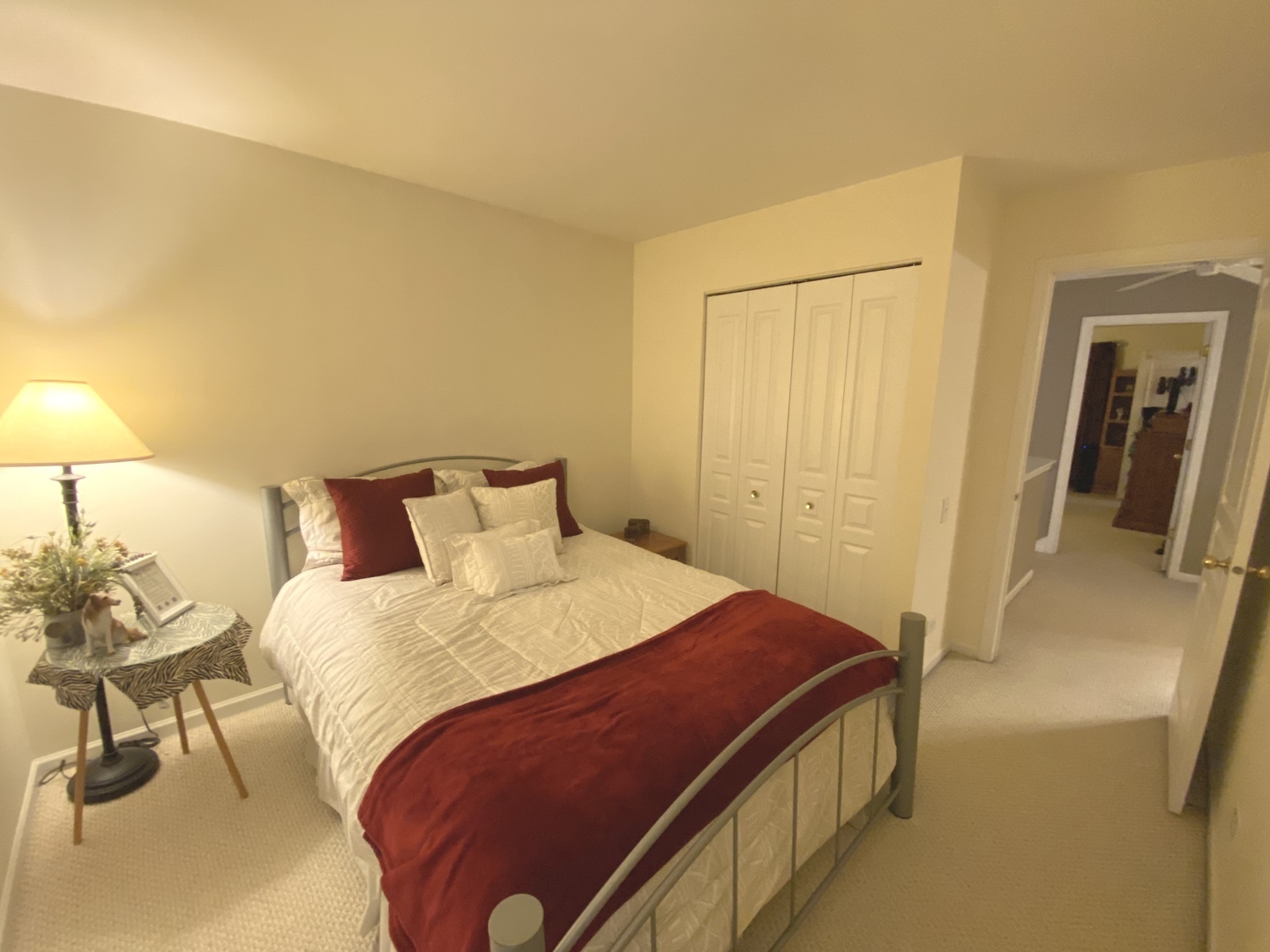 418 Cardinal Drive Bartlett, IL 60103 - Photo 19 of 29 a bedroom with a bed and a lamp