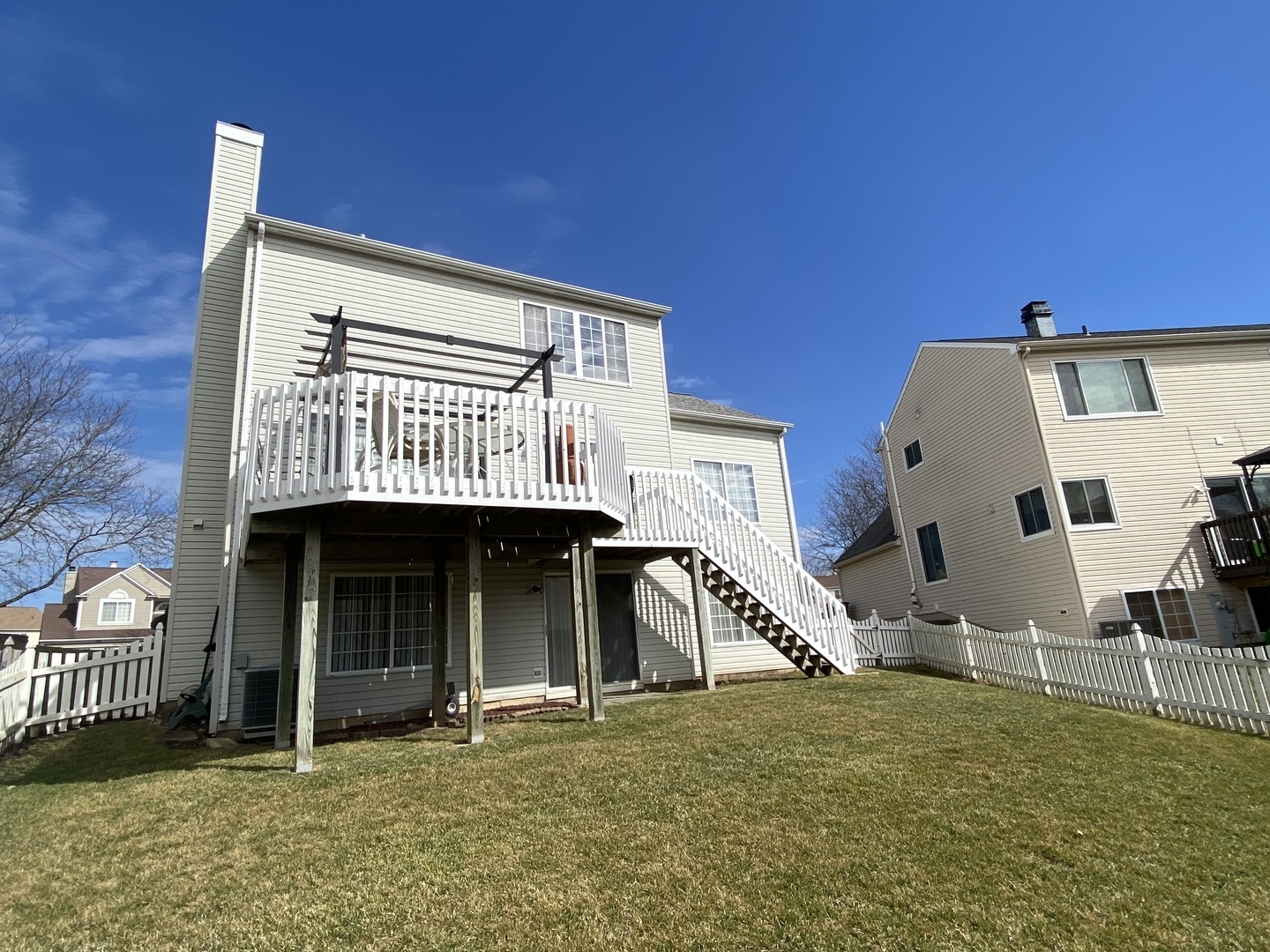 418 Cardinal Drive Bartlett, IL 60103 - Photo 28 of 29 a view of a house with roof deck