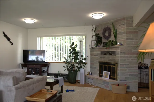 a living room with furniture and a table
