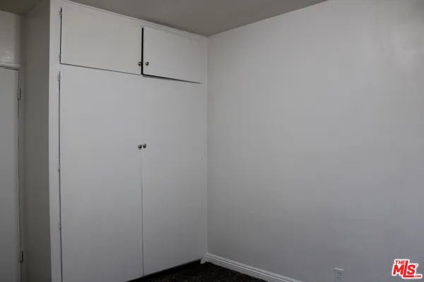 a view of small space with racks on the wall