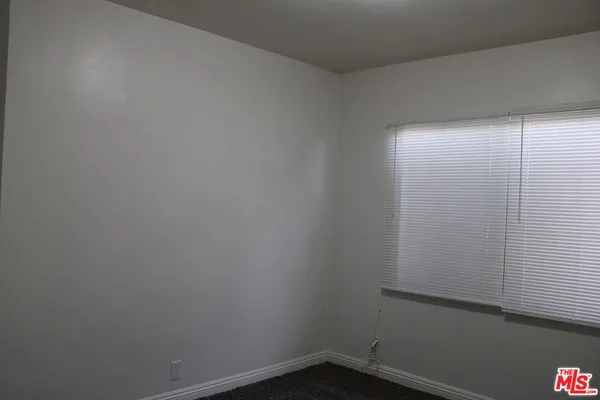 a kitchen with a sink and a window