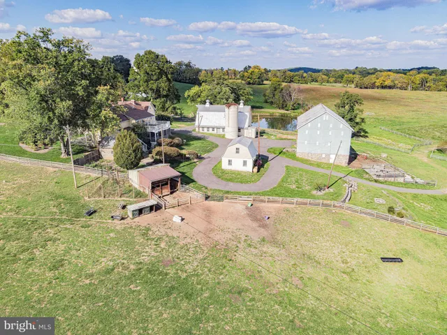 a front view of house with yard and outdoor seating