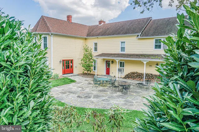 a view of living room with furniture and a flat screen tv