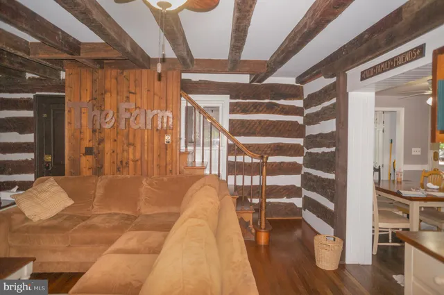 a room with a window and a wooden floor