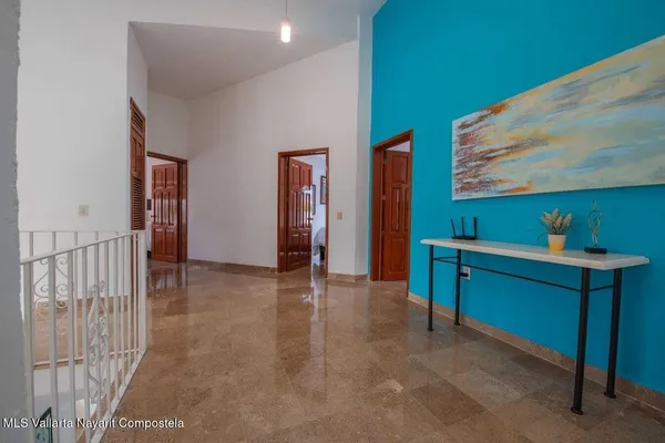 a view of livingroom with furniture and fan