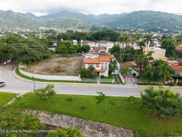 an aerial view of residential house with outdoor space