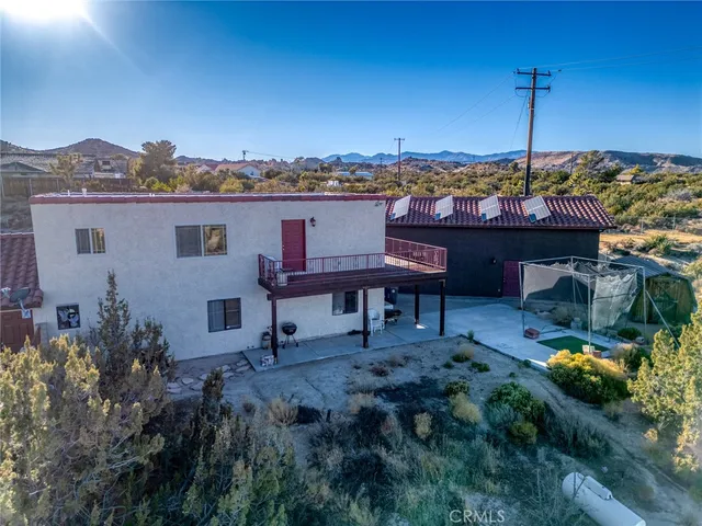 a bathroom with a shower and a mirror