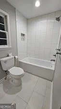 a bathroom with a bathtub
