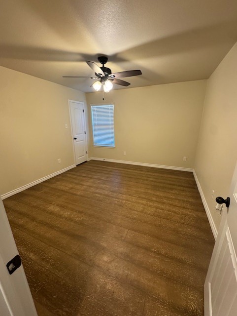101 Calvin Smith Ln., Unit B Jarrell, TX 76537 - Photo 23 of 33 Third bedroom featuring wood-like flooring and ceiling fan