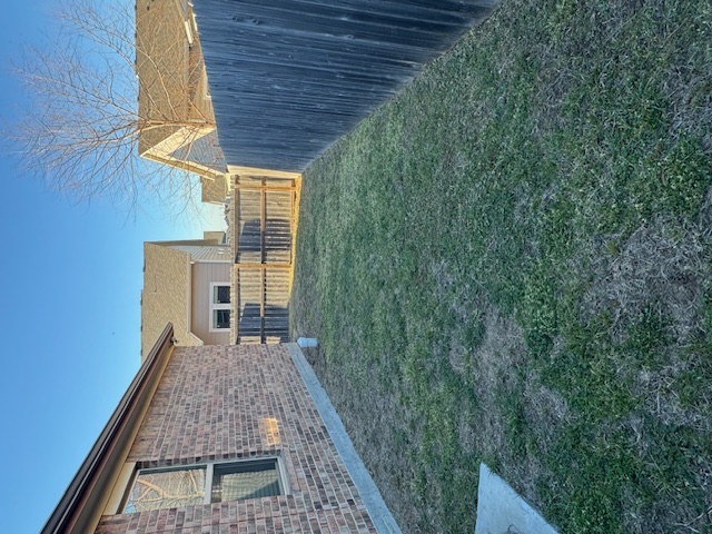 101 Calvin Smith Ln., Unit B Jarrell, TX 76537 - Photo 27 of 33 View of fenced backyard