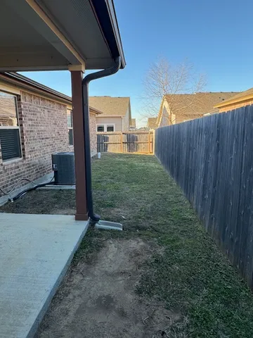 a view of a backyard with garden