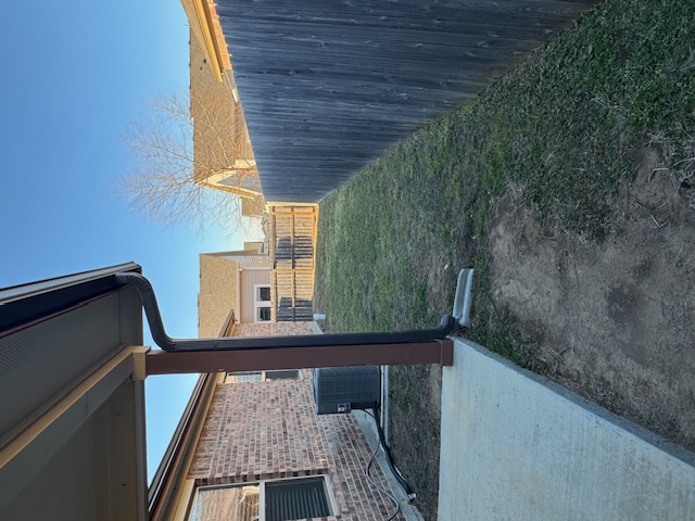 101 Calvin Smith Ln., Unit B Jarrell, TX 76537 - Photo 28 of 33 Fenced backyard with a patio area