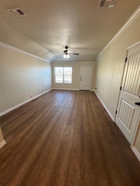 101 Calvin Smith Ln., Unit B Jarrell, TX 76537 - Photo 3 of 33 Unfurnished living room with ornamental molding, wood-;like flooring, and a ceiling fan!